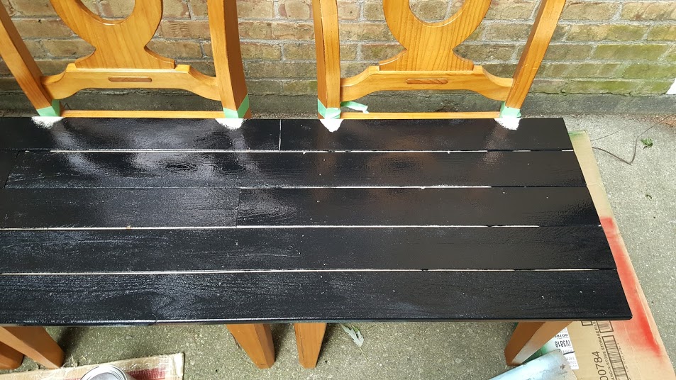 Added to coats of flat black paint to the chair bench