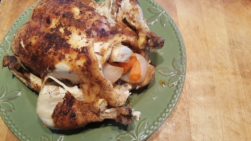 Whole30 Roasted Chicken with the chicken falling off the bone because it is so moist and tender.