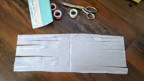 cutting tissue paper tassel garland