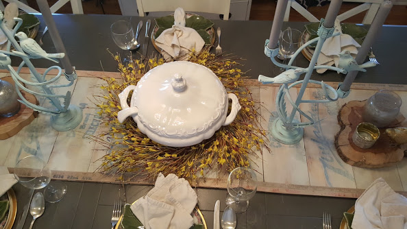 wooden farmhouse table runner with nature themed place settings