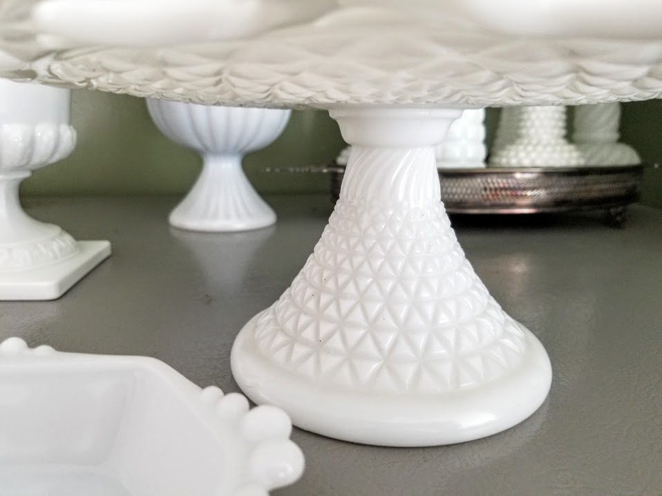 displaying milk glass cake plate